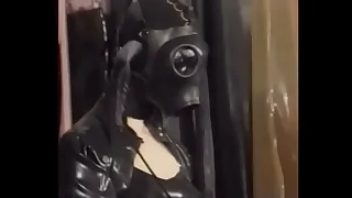 Natalia Muehlhausen latex slave in hood and gasmask gets a good fuck distance from her master &lpar;from 'Gummi in der Ehe'&rpar;